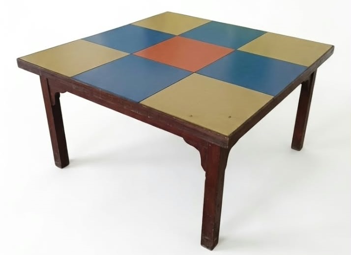 Square Montessori table with blue, yellow, and red sections