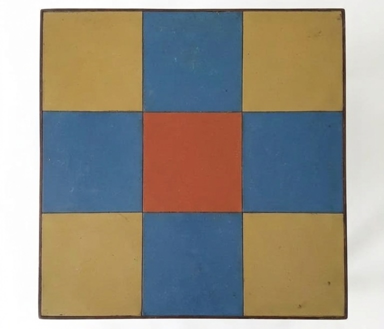 Wooden Montessori table with colorful patterned surface